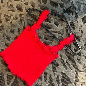 A red ruffled SHEIN crop top. Perfect for spring or summer days.